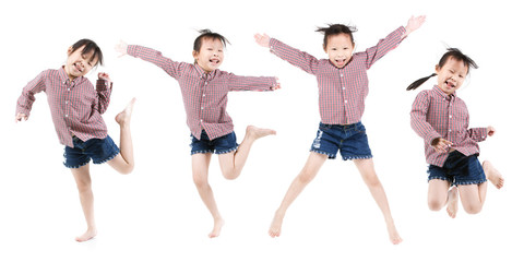 Portrait of happy little Asian child jumping isolated on white