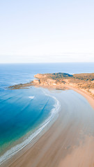 Aerial View of Beautiful Beach Coastline with Person on top of Cliffs Along the Great Ocean Road Australia - 269129452