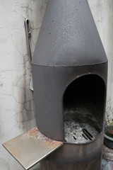 An oven stove of the outside of the house