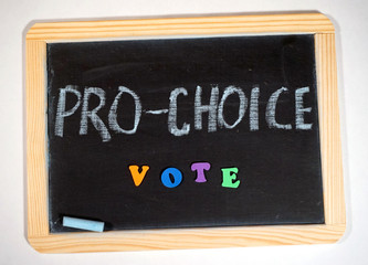 Pro-life and pro-choice message on chalkboard