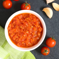 Homemade traditional Italian marinara or pomodoro tomato sauce made of fresh tomato, garlic, dried...