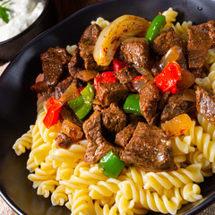 Fussili noodle with klaschise spicy goulash and paprika