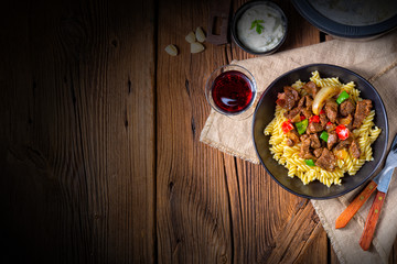 Fussili noodle with klaschise spicy goulash and paprika