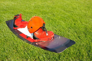 Sports equipment for wakesurf - lying on the green grass