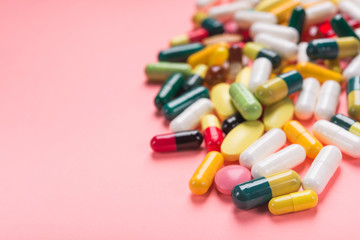 Pile of colored pills, capsule and tablets