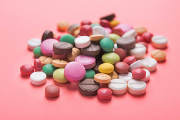 Pile of colored pills, capsule and tablets
