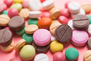 Fototapeta na wymiar Pile of colored pills, capsule and tablets