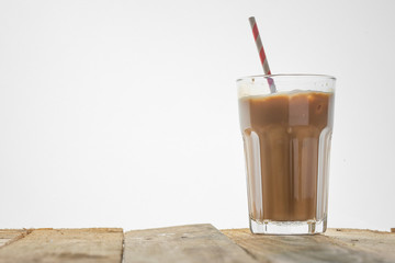 Iced coffee on a white background, with copy space. Cool summer drink