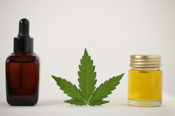 Cbd oil hemp leaf. Cannabis marijuana medicine concept