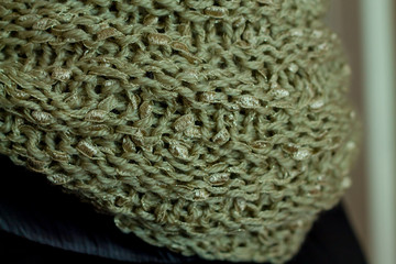 knitted textured snood on a girl's neck close up