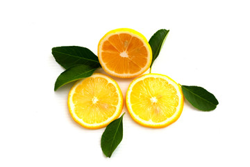 fresh lemon with lime and leaves isolated on white background
