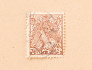 THE NETHERLANDS 1950: A stamp printed in the Netherlands shows the queen, circa 1950