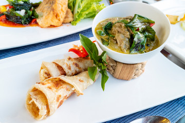 traditional beef green curry with roti - Thai halal food