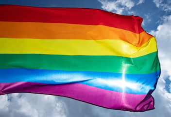 Colorful LGBT flag blows in the breez.