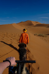 Guided camel sunset tour through the Erg Chebbi sand dunes in the Sahara Desert, Merzouga, Morocco