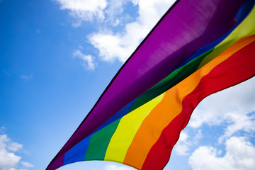 Colorful LGBT flag blows in the breez.