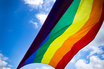 Colorful LGBT flag blows in the breez.