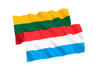 Obraz premium National fabric flags of Luxembourg and Lithuania isolated on white background. 3d rendering illustration. 1 to 2 proportion.
