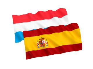 National fabric flags of Luxembourg and Spain isolated on white background. 3d rendering illustration. 1 to 2 proportion.