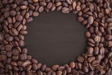  Place for inscription. Coffee beans on a black background