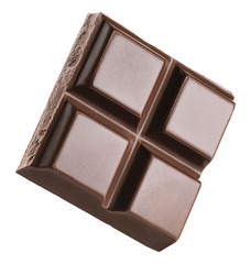 Piece of chocolate bar isolated on white background.