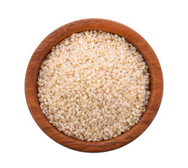 White sesame in wooden bowl on white background.