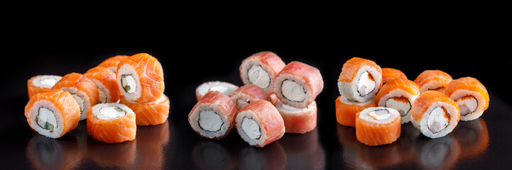 Classic sushi roll. Sushi at black background.Japanese seafood sushi , sushi a black background.