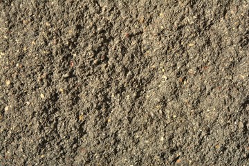 rough concrete wall with traces of erosion