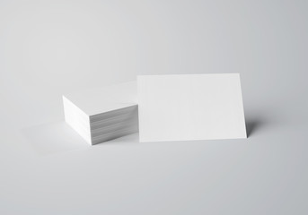 Stack of white business cards mockup isolated on white 3d rendering