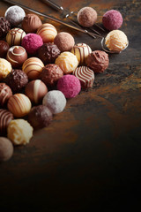 Luxury chocolate pralines in neat diagonal lines