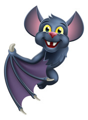 A cute Halloween vampire bat animal cartoon character peeking around from behind a sign and pointing at it with their wing
