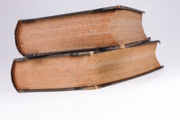 Fototapeta premium Two old books on white. Old publication. White isolated background