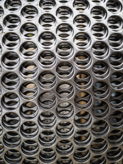Metal coil for concrete reinforcement. Plate with holes for masonry blocks and bricks