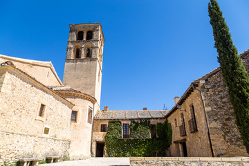 Fototapeta na wymiar Pedraza, Castilla Y Leon, Spain: Iglesia de San Juan Bautista. Pedraza is one of the best preserved medieval villages of Spain, not far from Segovia