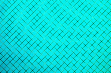 Fototapeta premium Colorful gridded paper background (rhombuses). Graphic resource.