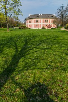 Prague, Czech Republic / Europe - April 05 2017: Chodov fortress, originally a round medieval fortress from 13th century, spring sunny day, a park with trees and green grass, vertical image