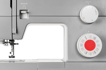 Modern electric sewing machine isolated on white background