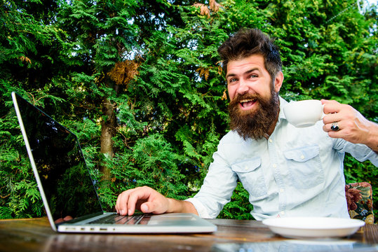 Bearded man freelance worker. Remote job. Freelance professional occupation. Caffeine booster for productivity. Online blog. Blogger freelance editor. Workaholic stereotype. Drink coffee work faster