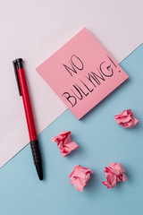 Writing note showing No Bullying. Business concept for stop aggressive behavior among children...
