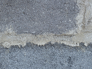 Mur en parpaing avec béton