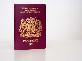 New Bergundy UK passport, no longer showing words 'European Union'. With currency, pounds sterling....