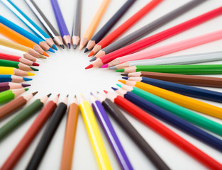colored pencils lying around the heart