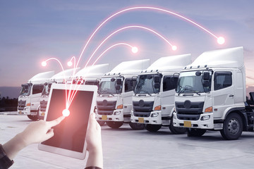 Multiple exposures of business shipping, logistics, industry background overall. New truck fleet with container depot as for shipping and logistics transportation industry.