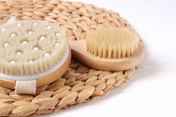 Brush for dry massage on a light background.