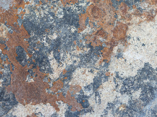 Texture sol en pierre couleur rouille et bleu