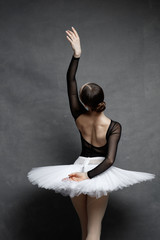 one ballerina dancing on a retro background