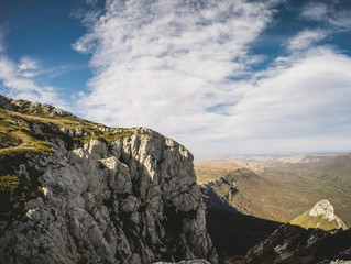 Beautiful summer sunny mountain landscape with a clear blue sky with clouds background. Crimean mountains