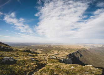 Beautiful summer sunny mountain landscape with a clear blue sky with clouds background. Crimean mountains