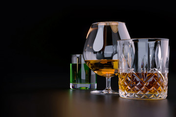 Strong alcoholic beverages, glasses and glasses, in the presence of whiskey, vodka, rum, tequila,...