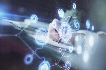 Double exposure of hands making notes background with technology and digital coding huds. Data learning concept.